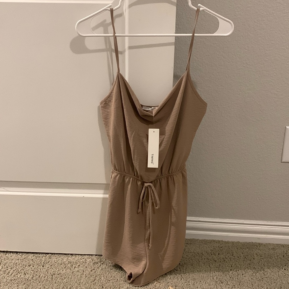 Cute blush pink boutique romper